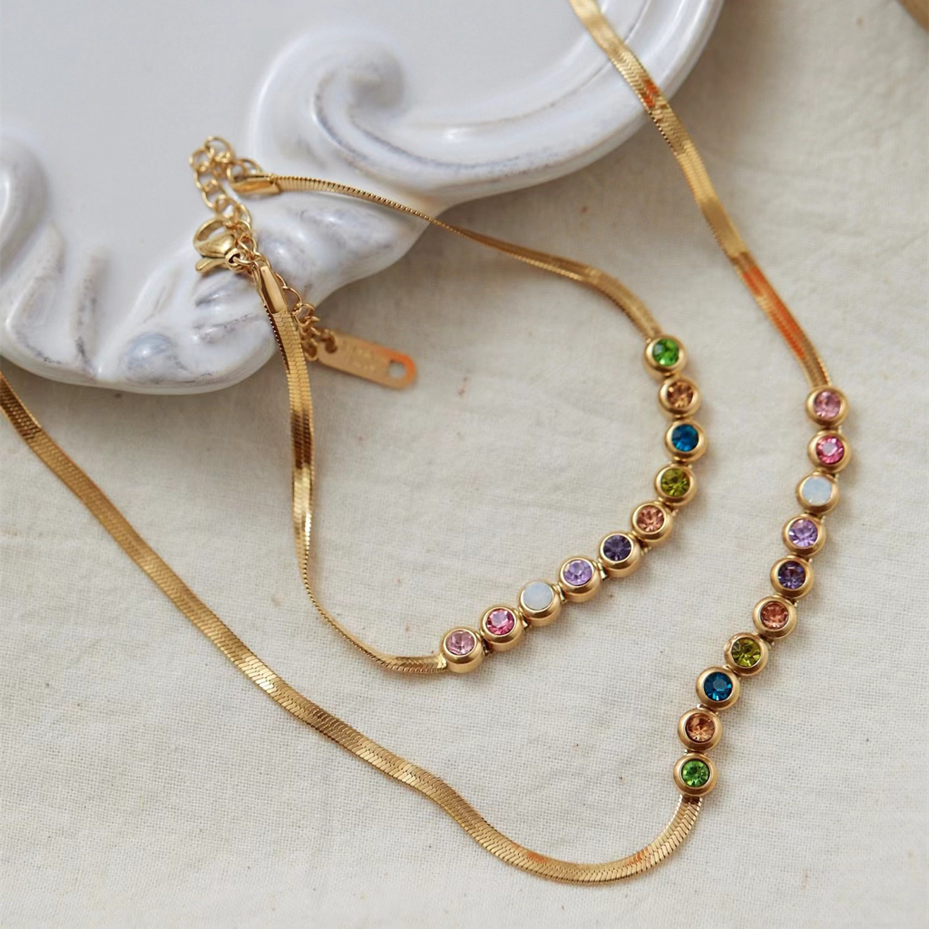 สไตล์ใหม่เงาที่มีสีสันรอบเพชรใบมีดโซ่18เคสีทองอ้างอิงสร้อยคอเหล็กไทเทเนียมสร้อยข้อมือ