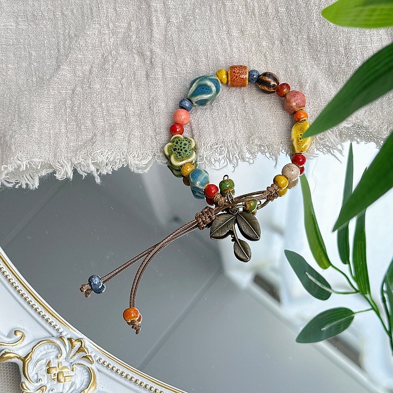 ใหม่จีนที่มีสีสันเซรามิกดาวสร้อยข้อมือย้อนยุคโลหะใบจี้ผู้หญิงเครื่องประดับมือสําหรับผู้หญิงสร้อยข้อมือ - รูปที่ 2