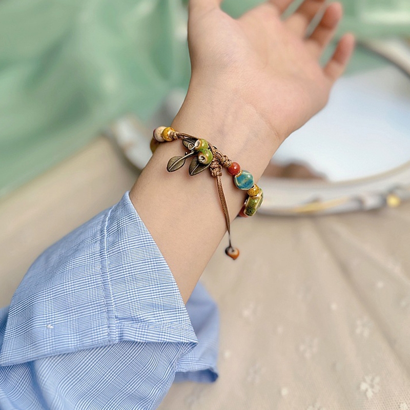 ใหม่จีนที่มีสีสันเซรามิกดาวสร้อยข้อมือย้อนยุคโลหะใบจี้ผู้หญิงเครื่องประดับมือสําหรับผู้หญิงสร้อยข้อมือ - รูปที่ 6