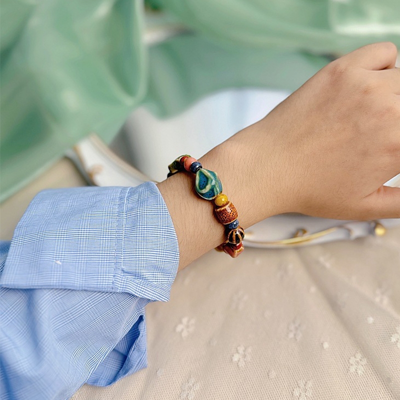 ใหม่จีนที่มีสีสันเซรามิกดาวสร้อยข้อมือย้อนยุคโลหะใบจี้ผู้หญิงเครื่องประดับมือสําหรับผู้หญิงสร้อยข้อมือ - รูปที่ 7