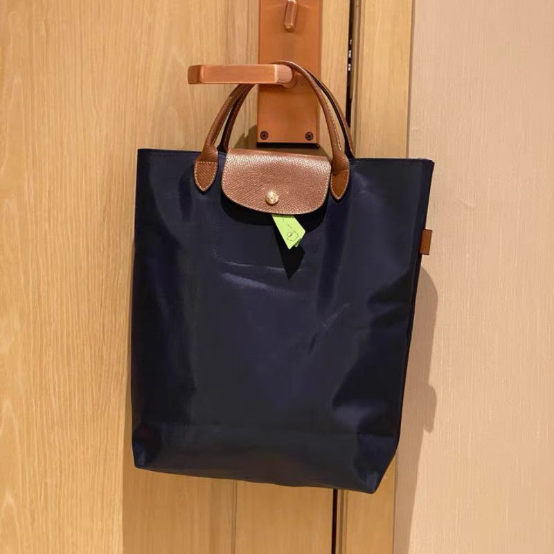 Energy Series Longni กระเป๋าถือแนวตั้งความจุขนาดใหญ่ Tote Bag Clutch Dumpling Bag กระเป๋าคอมพิวเตอร์ Original Order LX333333-1111