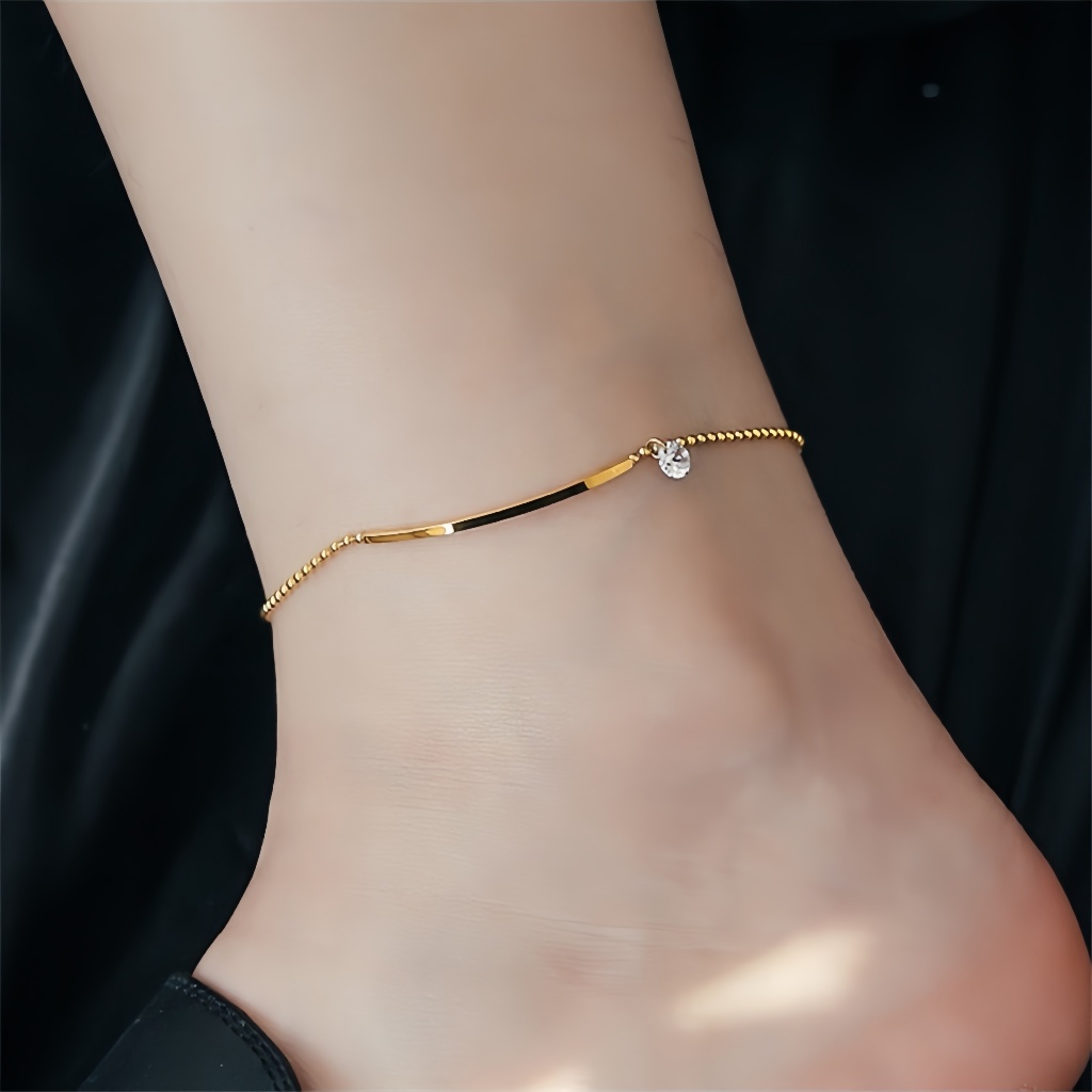 Zircon Smileไม่สมมาตรสร้อยข้อเท้าชุบ 18K Gold Titanium Steel Non-Fade Washable ins Simple All-Match Niche Design Foot Chain เครื่องประดับ