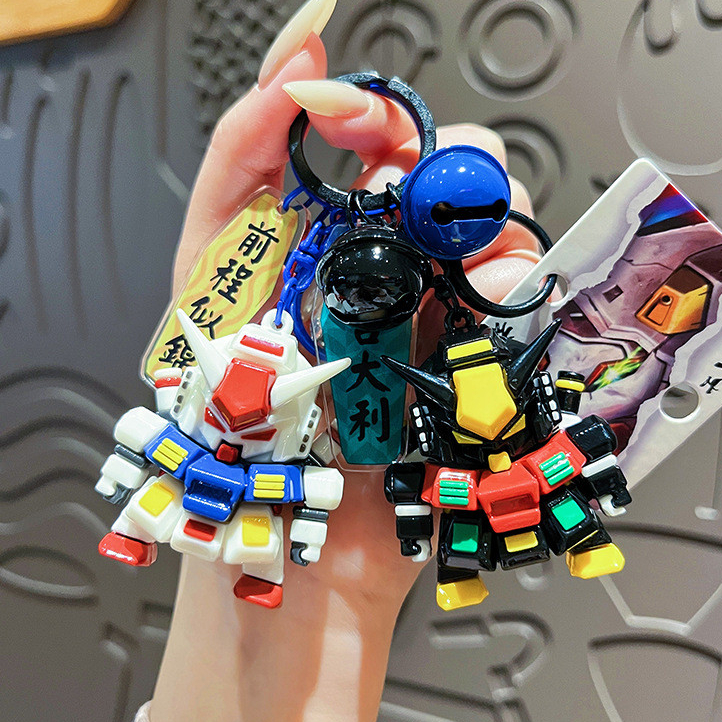 Original UV Storm Mecha Warrior พวงกุญแจ/การ์ตูนน่ารักตุ๊กตาหุ่นยนต์จี้ของขวัญขนาดเล็ก