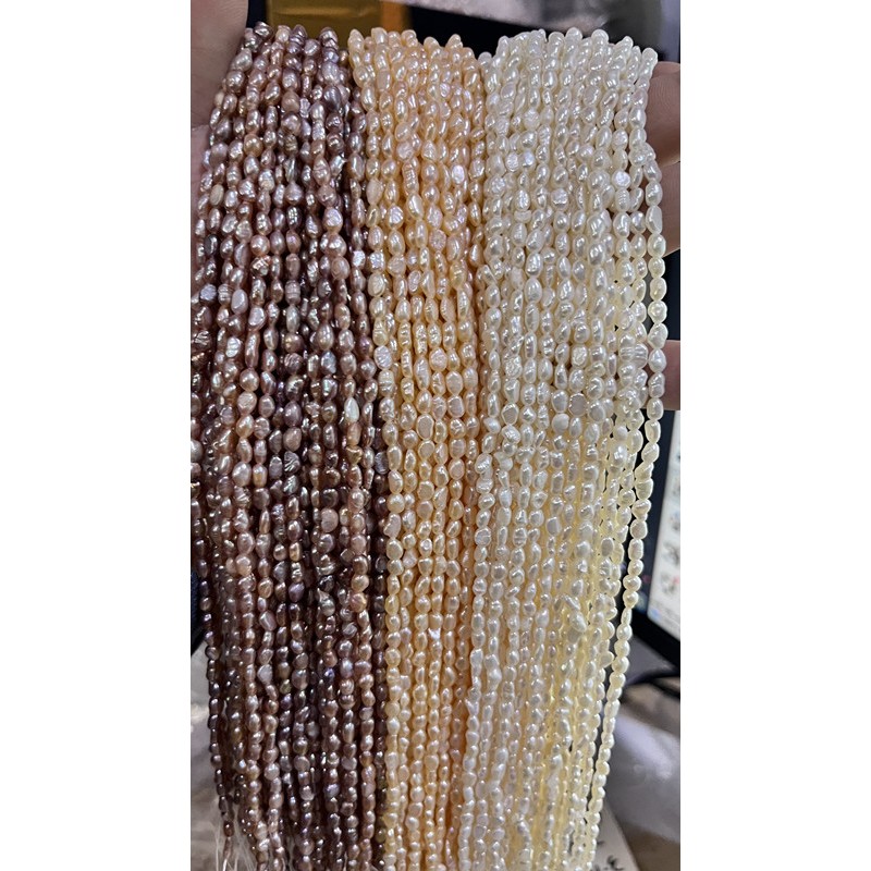 ราคาขายส่ง 3-4 มม. สีธรรมชาติไข่มุกน้ําจืดแท้เกลียวรูตรงสําหรับทําเครื่องประดับ