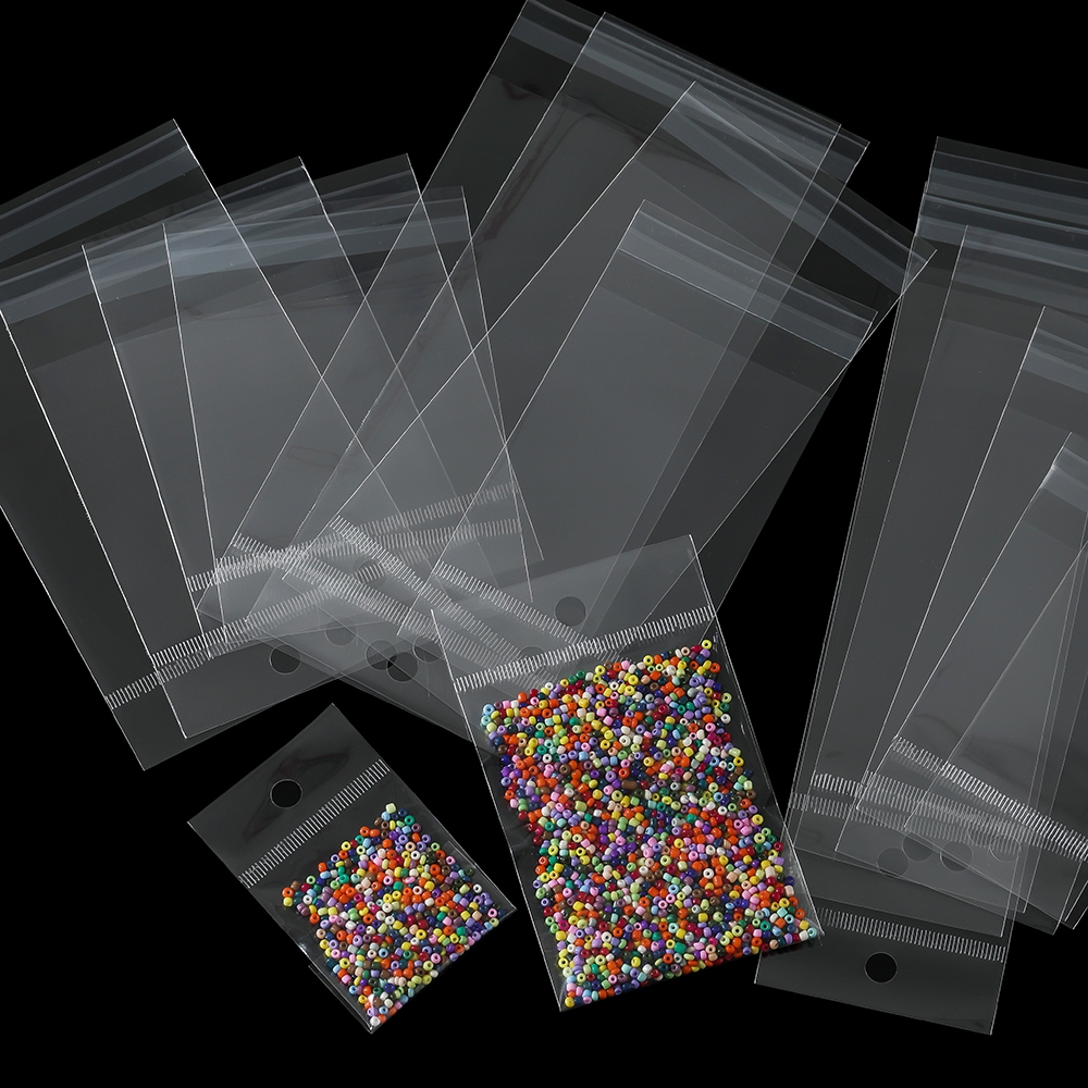 St. kunkka 100 ชิ้น โปร่งใสซีลกาวตนเองถุงเก็บพลาสติก OPP แพ็คขึ้น กระเป๋าแขวน - รูปที่ 3