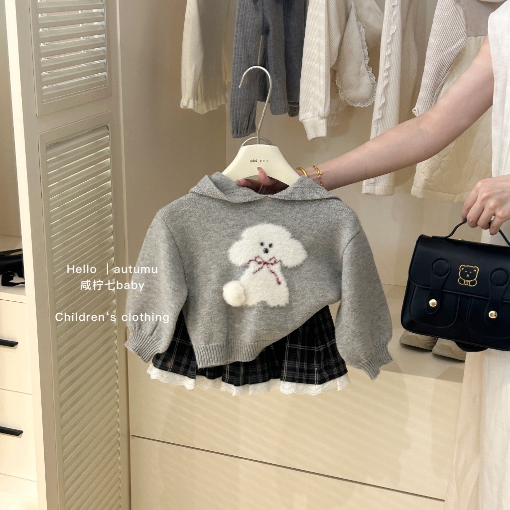 ฤดูใบไม้ร่วงฤดูหนาวรูปแบบใหม่สาวน่ารักลูกสุนัขคลุมด้วยผ้าถักเสื้อกันหนาวด้านบนจีบกระโปรงสอง