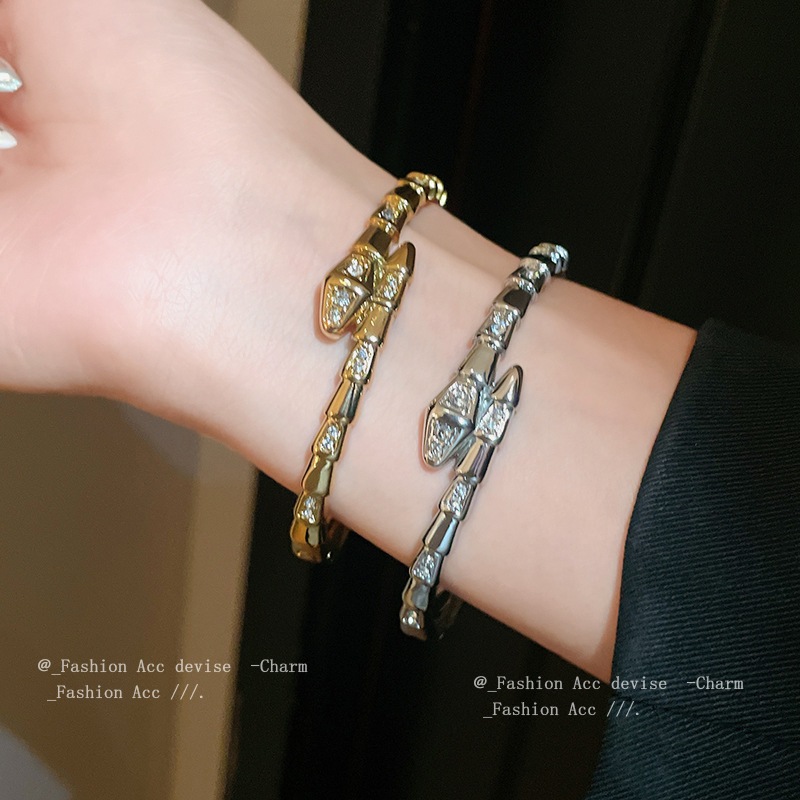 [จูวบิวตี้]เพทายงูขนาดเล็กข้ามเปิดสร้อยข้อมือยุโรปและสหรัฐอเมริกาคุณภาพสูงประณีตสร้อยข้อมือพร็อพการออกแบบความรู้สึกแสงหรูหราเครื่องประดับมือขายส