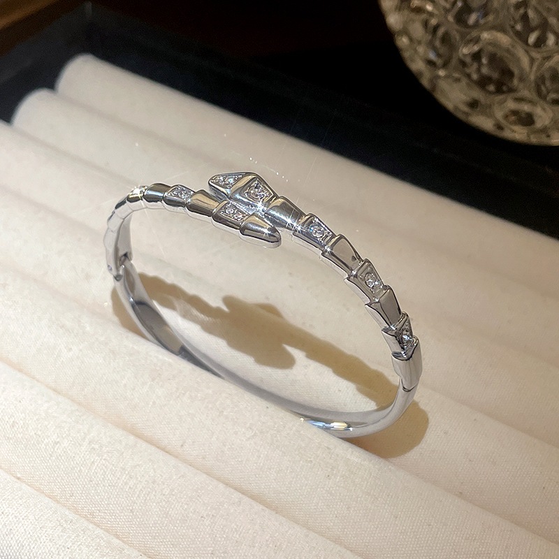 [จูวบิวตี้]เพทายงูขนาดเล็กข้ามเปิดสร้อยข้อมือยุโรปและสหรัฐอเมริกาคุณภาพสูงประณีตสร้อยข้อมือพร็อพการออกแบบความรู้สึกแสงหรูหราเครื่องประดับมือขายส - รูปที่ 3