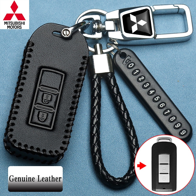 Mitsubishi 2 ปุ่มหนังแท้กุญแจรีโมทรถยนต์สําหรับ Mitsubishi xpander/pajero/Triton/pajero sport 2018/Mirage/Attrage ฝาครอบกุญแจพวงกุญแจ