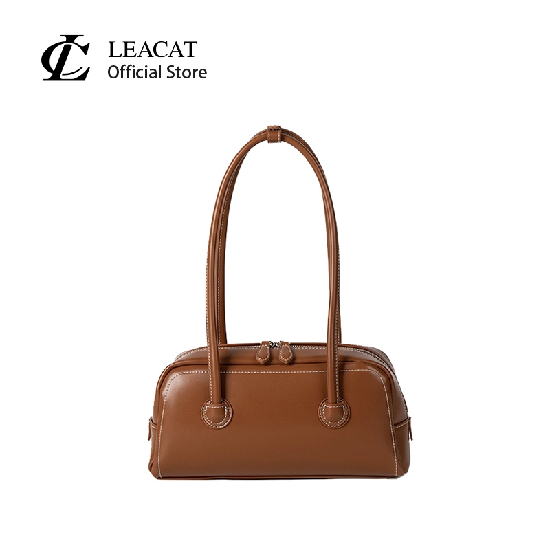 Leacat กระเป๋าสะพายสีทึบความรู้สึกระดับไฮเอนด์หญิงซอกโบว์ลิ่งกระเป๋าบอสตันกระเป๋าถือแฟชั่น