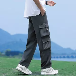 M-5XL กางเกงคาร์โก้สีดําผู้ชายแฟชั่นหลวมขนาดบวกกางเกงขายาวลําลองตรง กางเกงผู้ชาย