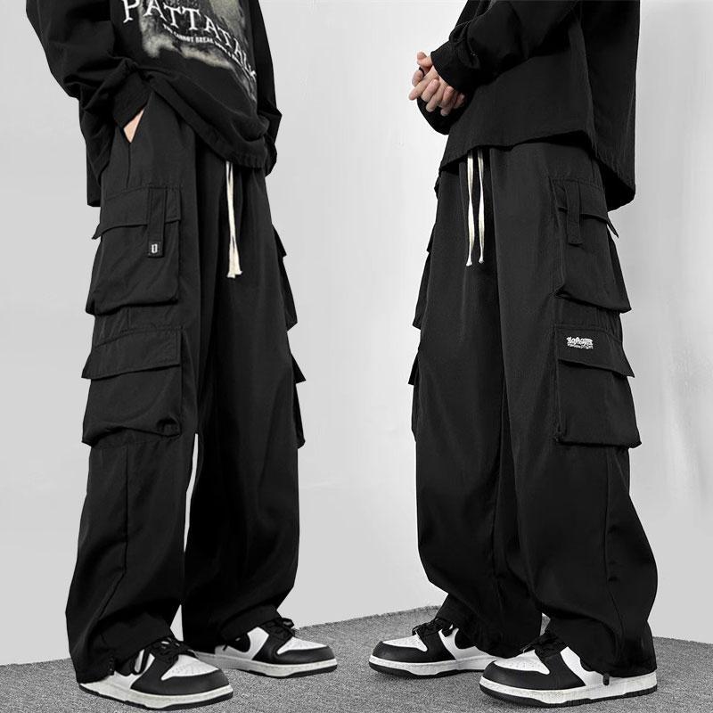 M-5XL กางเกงคาร์โก้สีดําผู้ชายแฟชั่นหลวมขนาดบวกกางเกงขายาวลําลองตรง กางเกงผู้ชาย