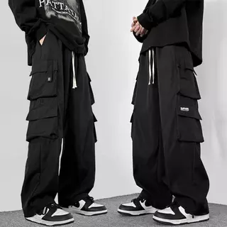 M-5XL กางเกงคาร์โก้สีดําผู้ชายแฟชั่นหลวมขนาดบวกกางเกงขายาวลําลองตรง กางเกงผู้ชาย