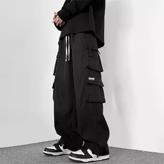 M-5XL กางเกงคาร์โก้สีดําผู้ชายแฟชั่นหลวมขนาดบวกกางเกงขายาวลําลองตรง กางเกงผู้ชาย