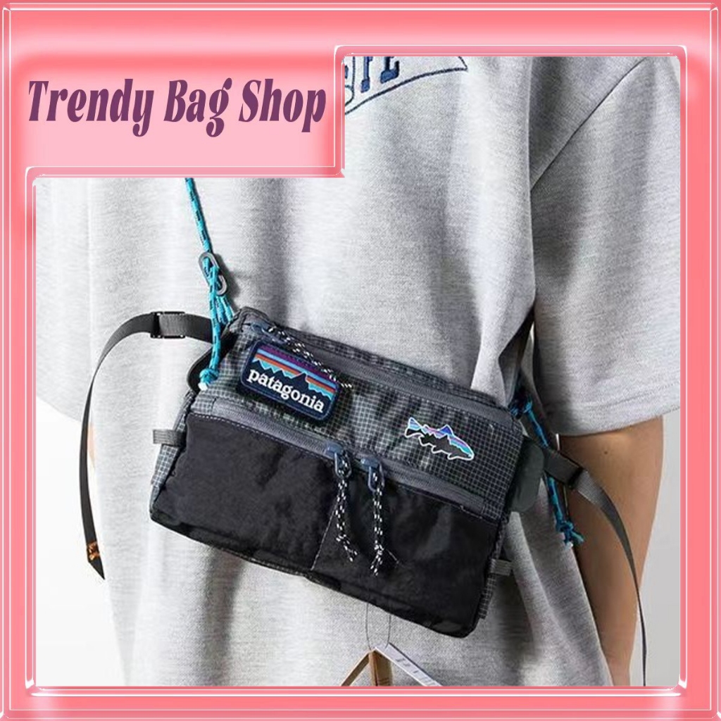 Patagonia กระเป๋าสะพายข้างแฟชั่น ใหม่ กระเป๋าสะพายไหล่ สะพายข้าง ลายปลาบิน