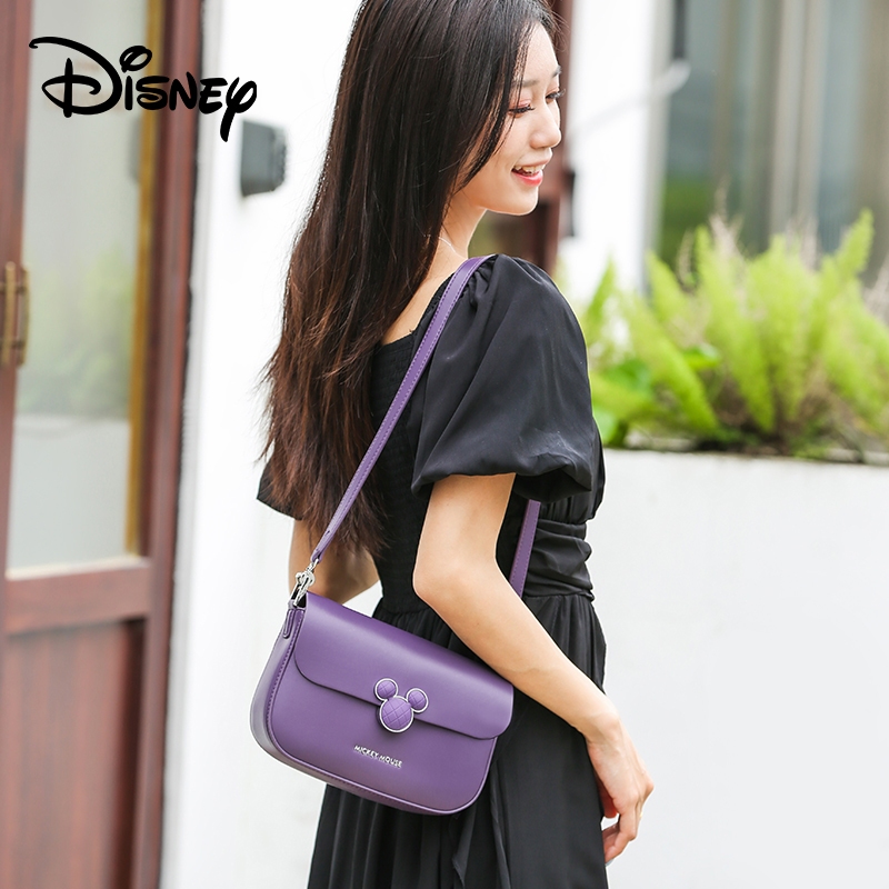 Disney ของแท้ Mickey Co-Branded Series Charm แฟชั่นอินเทรนด์กระเป๋าสะพายสุภาพสตรี Niche กระเป๋า Messenger ความจุขนาดใหญ่ทั้งหมด