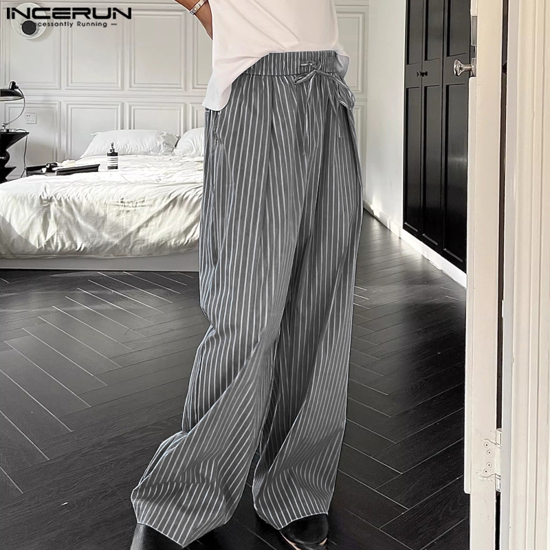 ไม่แน่นอน ผู้ชายเกาหลีที่เรียบง่ายลาย เชือกรูด เอวยางยืดกางเกงลําลอง