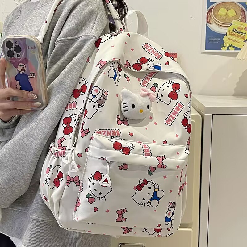 ผู้หญิง ใหม่ Hello Kitty แฟชั่นการ์ตูนน่ารักความจุขนาดใหญ่เด็กเดินทางกลางแจ้งกระเป๋าเป้สะพายหลังนักเรียนกระเป๋านักเรียน