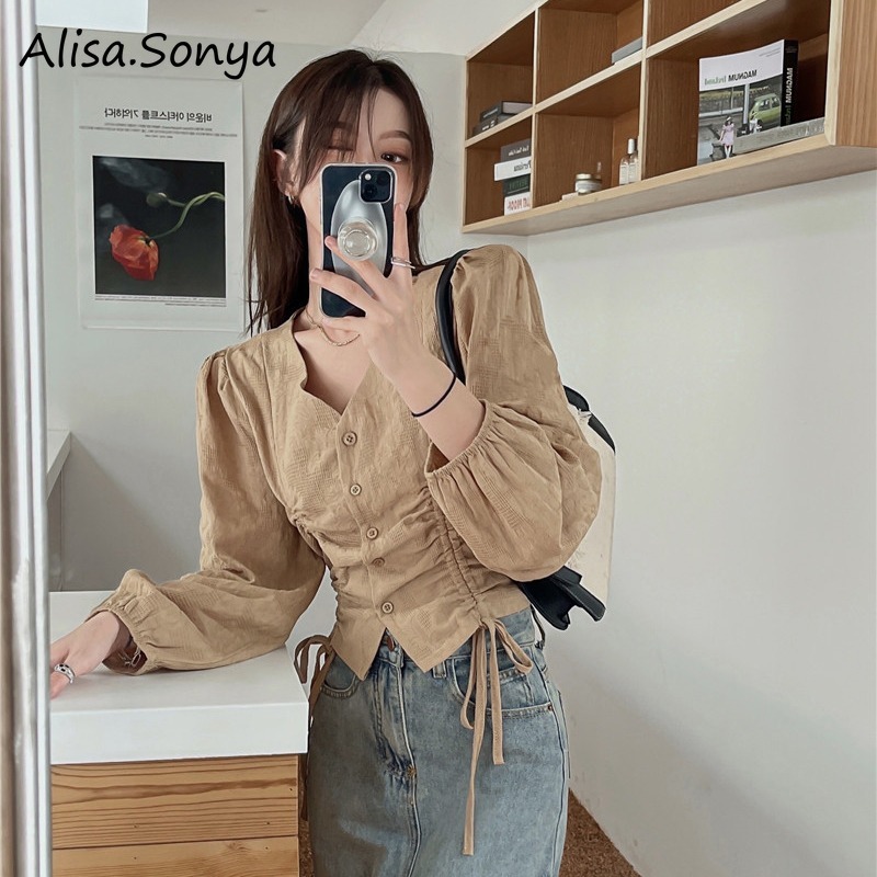 Alisa.sonya เสื้อเบลาส์แขนยาววินเทจสําหรับผู้หญิงผูกปมลําลองปุ่มลงเสื้อ