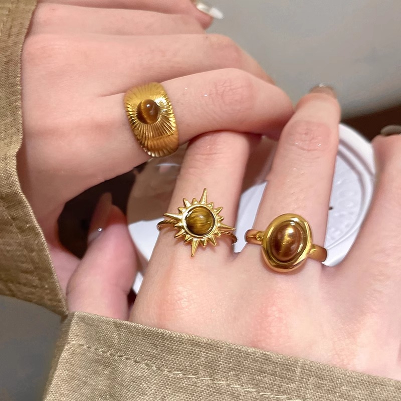 เกาหลีแฟชั่นดอกทานตะวันเสือตาหินแหวนผู้หญิงสีทอง อิน ของขวัญวันเกิดนักเรียน