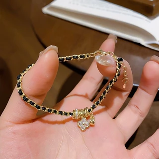 [จูวบิวตี้]หนังเทียมโซ่เพทายสร้อยข้อมือดอกไม้หญิงแฟชั่นซอกร้อยแขนสร้อยข้อมืออารมณ์แสงหรูหราความรู้สึกสูงของเครื่องประดับมือ
