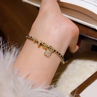 [จูวบิวตี้]หนังเทียมโซ่เพทายสร้อยข้อมือดอกไม้หญิงแฟชั่นซอกร้อยแขนสร้อยข้อมืออารมณ์แสงหรูหราความรู้สึกสูงของเครื่องประดับมือ