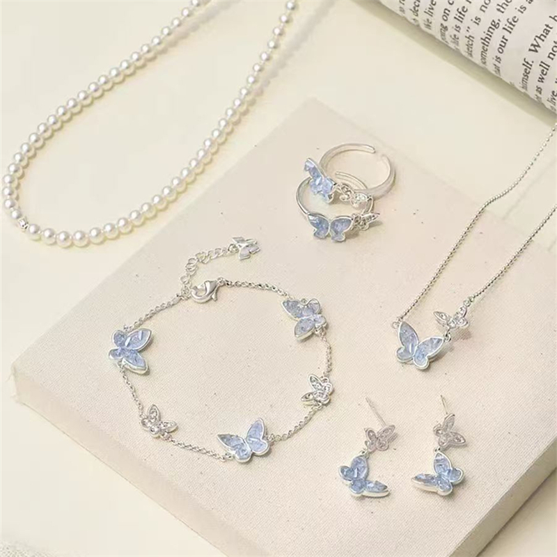 หลานซิ่ว ขายส่งคริสตัลสีฟ้าเพชรผีเสื้อสร้อยคอสร้อยข้อมือต่างหูแหวนชุดสําหรับผู้หญิงวันหยุดเครื่องประดับของขวัญ