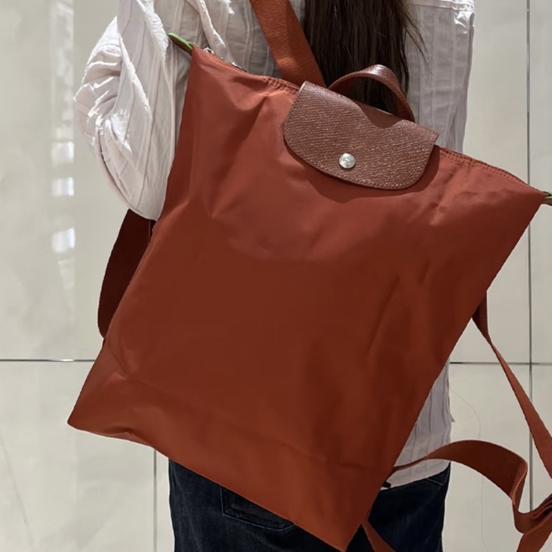 สงครามม้าใหม่ไนลอนขนาดใหญ่กระเป๋าเป้สะพายหลังน้ําหนักเบาพับกระเป๋าเป้สะพายหลังกระเป๋าเดินทางพักผ่อนกันน้ํา - รูปที่ 2