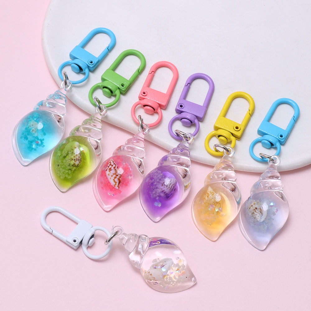 พวงกุญแจสังข์เรืองแสงสีสันสดใส 1 ชิ้นสําหรับของขวัญเด็ก Charm แยกแหวน Keyfob