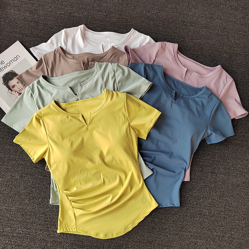 ใส่แผ่นบางกีฬายุโรปและอเมริกาเสื้อยืดและผู้หญิงวิ่งโยคะสวมใส่ด้านบนกับหน้าอก
