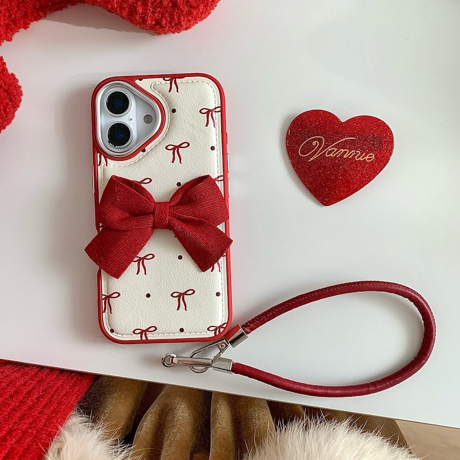 กรณีเข้ากันได้สําหรับ iPhone 16 16Pro 16Promax 15 promax 15Pro 14 13 12 11 14promax red bow Leather-like texture cover with strap โบว์สีแดง หนังเหมือนเนื้อปกพร้อมสายรัด