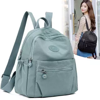 แฟชั่นผู้หญิงใหม่กระเป๋าเป้สะพายหลังไนลอน Candy สีทึบอินเทรนด์ Casual อเนกประสงค์ช้อปปิ้ง Mommy Bag