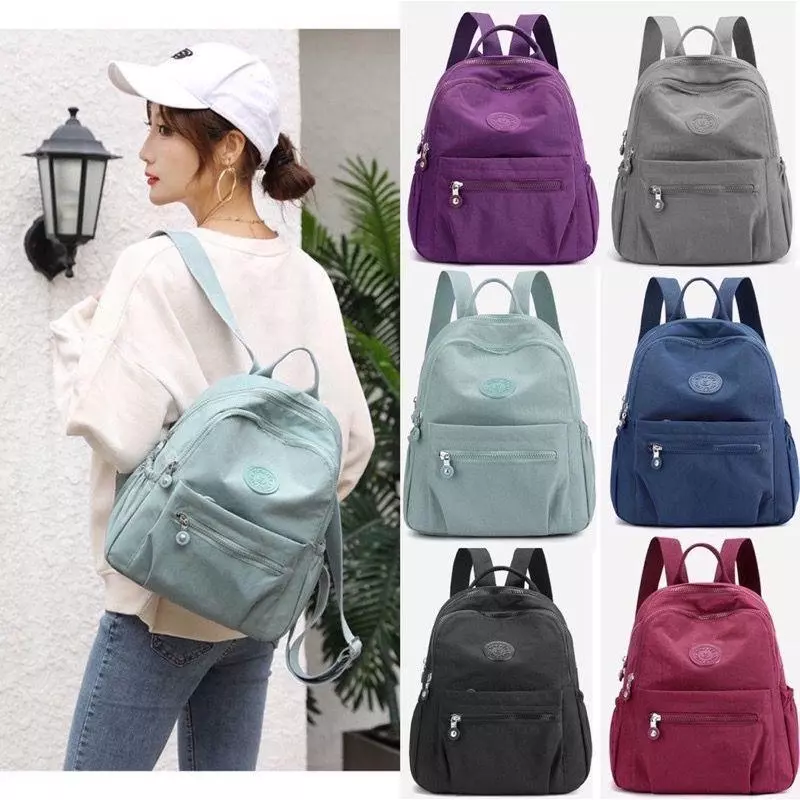 แฟชั่นผู้หญิงใหม่กระเป๋าเป้สะพายหลังไนลอน Candy สีทึบอินเทรนด์ Casual อเนกประสงค์ช้อปปิ้ง Mommy Bag