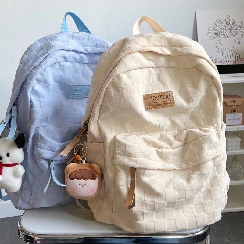 แฟชั่นกระเป๋าเป้สะพายหลังผู้หญิงใหม่สีทึบสบายๆเรียบง่ายนักเรียนน้ําหนักเบาเวอร์ชั่นเกาหลีอินเทรนด์ลําลองอเนกประสงค์ความจุขนาดใหญ่กระเป๋าคอมพิว