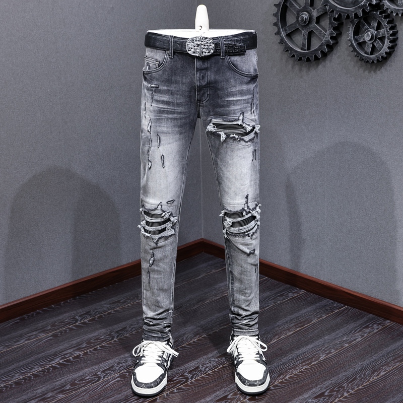 Amiri แฟชั่นและอินเทรนด์ผู้ชายกางเกงยีนส์สีดําสีเทาสลิมฟิตยืดหยุ่นออกแบบแพทช์หนังงานฝีมือสไตล์ย้อนยุ