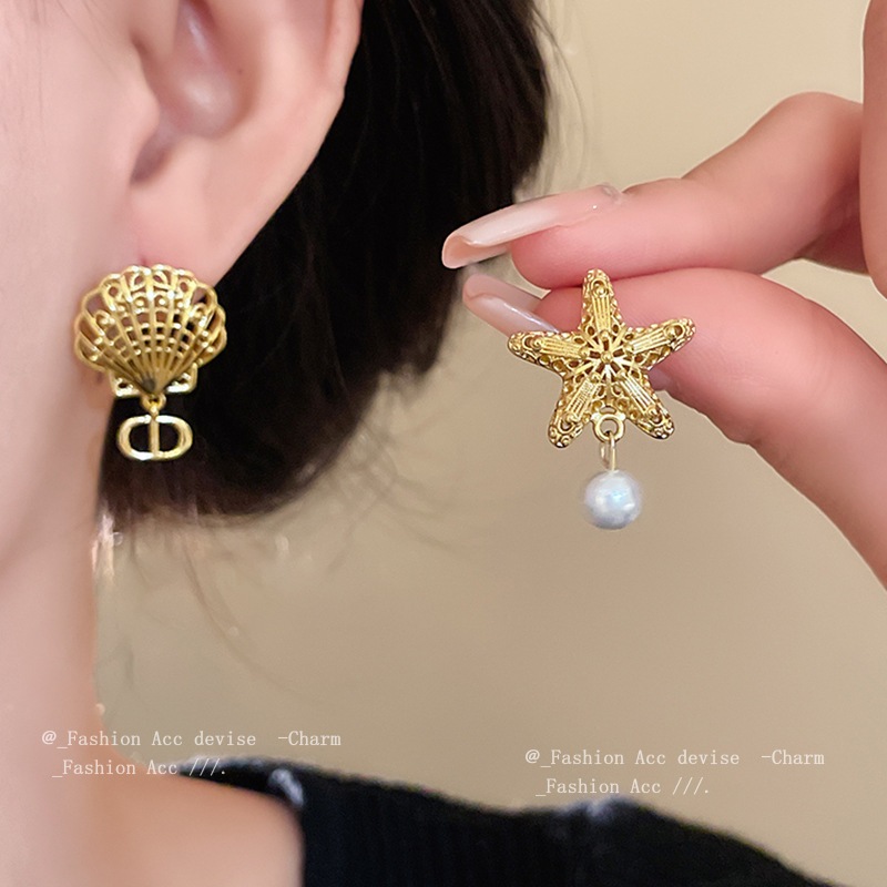 [จูวบิวตี้]เงินเข็มเปลือกปลาดาวต่างหูมุกอสมมาตร แฟชั่นต่างหูย้อนยุคบุคลิกภาพแสงหรูหราอุปกรณ์เสริมใหม่