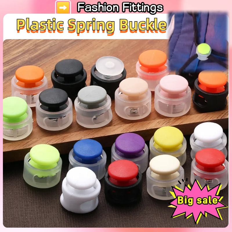 สีพลาสติกฤดูใบไม้ผลิหัวเข็มขัดหลุมคู่ทรงกระบอกหมูจมูกหัวเข็มขัดเชือกยืดหยุ่นหยุดลื่นหัวเข็มขัดหมวกยืดหยุ่น