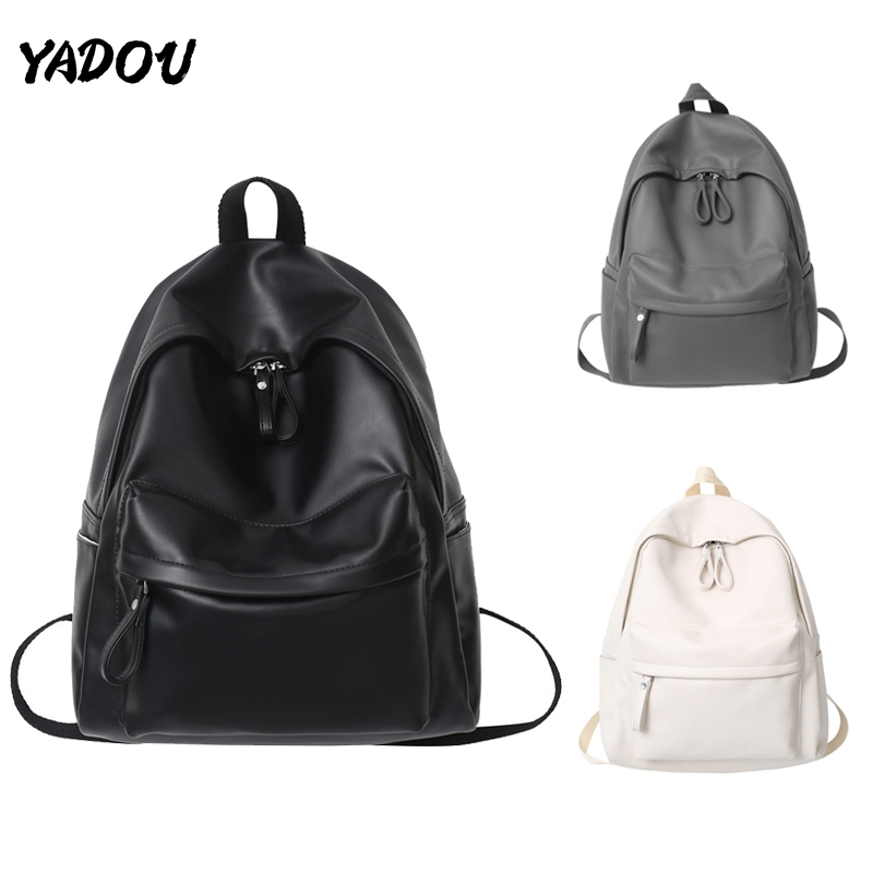 YADOU ใหม่เวอร์ชั่นเกาหลีเรียบง่ายกระเป๋านักเรียน unisex กระเป๋าเป้สะพายหลังหนังนุ่ม