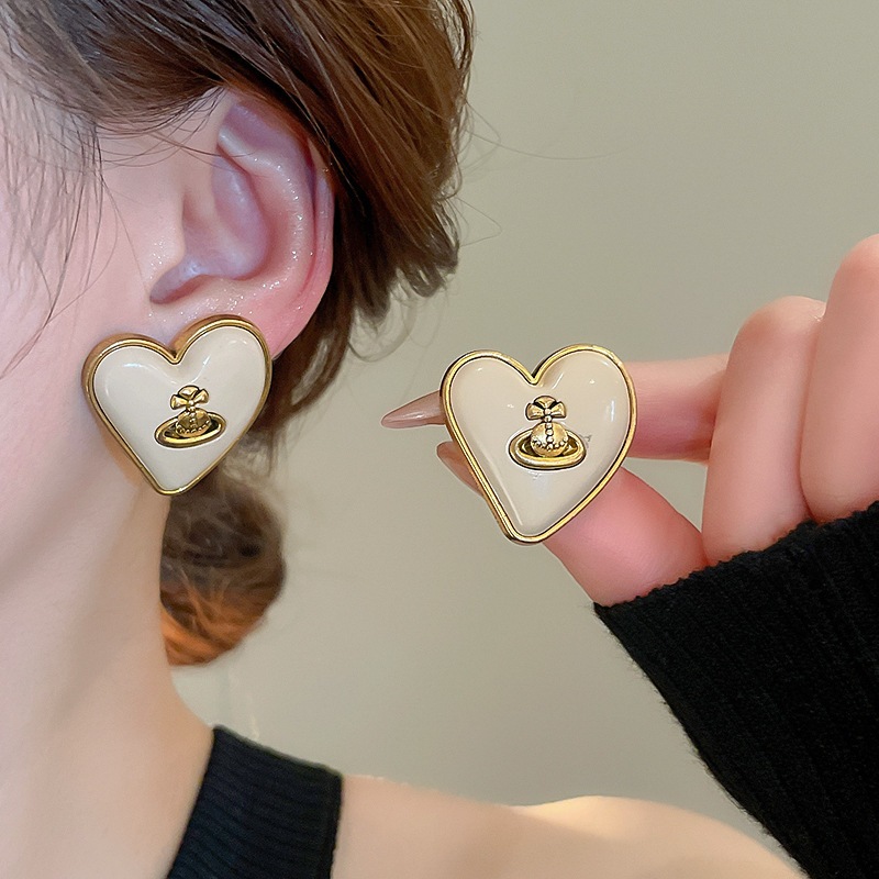 เข็มเงินย้อนยุครักดาวเคราะห์ดาวเสาร์ต่างหูหญิงซอกออกแบบต่างหูทั้งหมดแสงหรูหราความรู้สึกระดับสูงของต่างหูอารมณ์