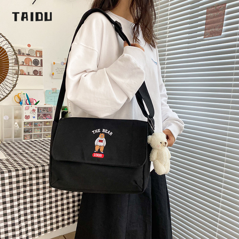 TAIDU กระเป๋าสะพายไหล่ลําลอง ผ้าแคนวาส ปักลายน่ารัก ความจุสูง เรียบง่าย แฟชั่นสไตล์ญี่ปุ่น