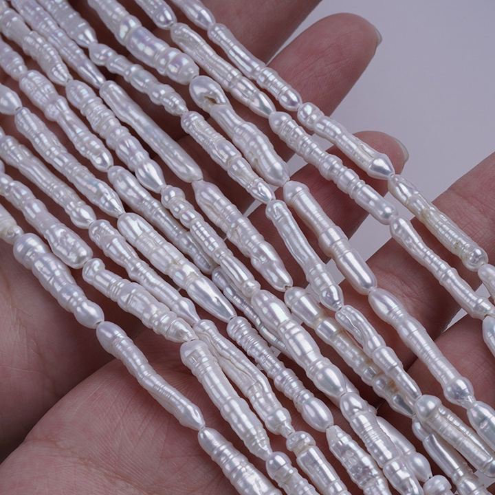 3-6 มม. สีขาวน้ําจืดธรรมชาติ biwa pearl strand หลุมตรงสําหรับเครื่องประดับทํา
