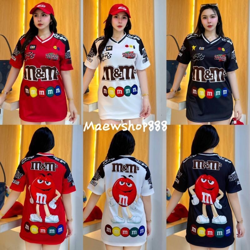 เสื้อเชิ้ตแฟชั่นและทรงหลวมสําหรับผู้ชายและผู้หญิง เสื้อยืดพิมพ์ลาย M&M ยอดนิยม