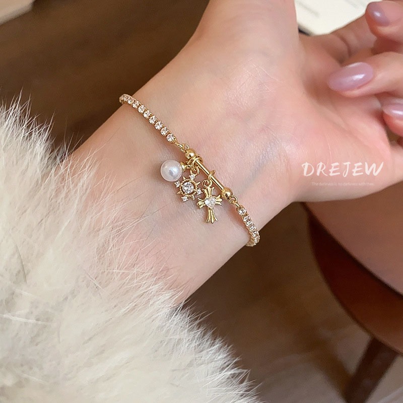 เดรช เพทายเกล็ดหิมะข้ามสร้อยข้อมือมุก แสงหรูหราระดับไฮเอนด์สร้อยข้อมือ ซอก แฟชั่นแสงหรูหราความรู้สึกการออกแบบผ้าเช็ดหน้าส