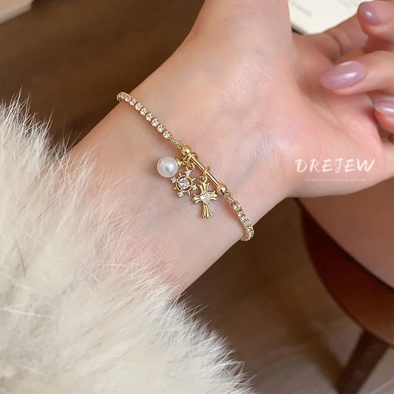 เดรช เพทายเกล็ดหิมะข้ามสร้อยข้อมือมุก แสงหรูหราระดับไฮเอนด์สร้อยข้อมือ ซอก แฟชั่นแสงหรูหราความรู้สึกการออกแบบผ้าเช็ดหน้าส
