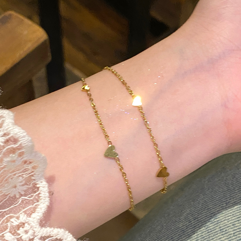 Golden Love สร้อยข้อมือเหล็กไทเทเนียมหรูหรา Niche ประณีตสร้อยคอแฟนสร้อยข้อมือผู้หญิงคลาสสิก Classy สร้อยข้อมือเครื่องประดับ