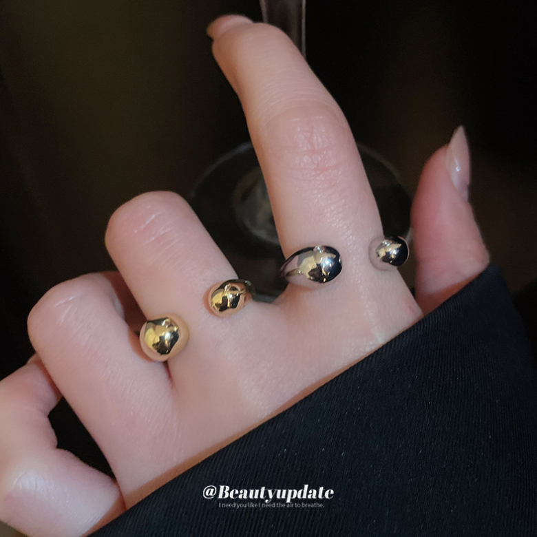 แหวนทรงหยดน้ําโลหะมันวาวอุปกรณ์เสริมแฟชั่นที่เรียบง่าย