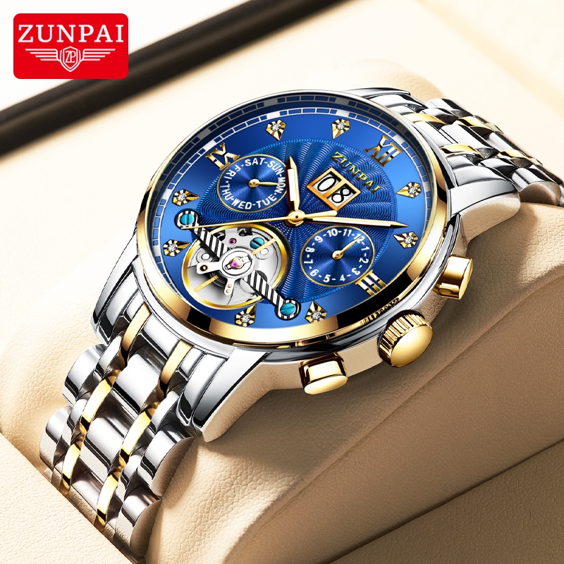 ZUNPAI นาฬิกาข้อมือผู้ชายสายสแตนเลสแบบ Tourbillon อัตโนมัติ พร้อมหน้าต่างกลวง หน้าปัดทรงกลม ทนทานต่อรอยขีดข่วน นาฬิกาแฟชั่นสำหรับธุรกิจ เรียบง่ายและลำลอง กันน้ำ เรืองแสง ปฏิทินถาวร ฟังก์ชันปฏิทินรายสัปดาห์