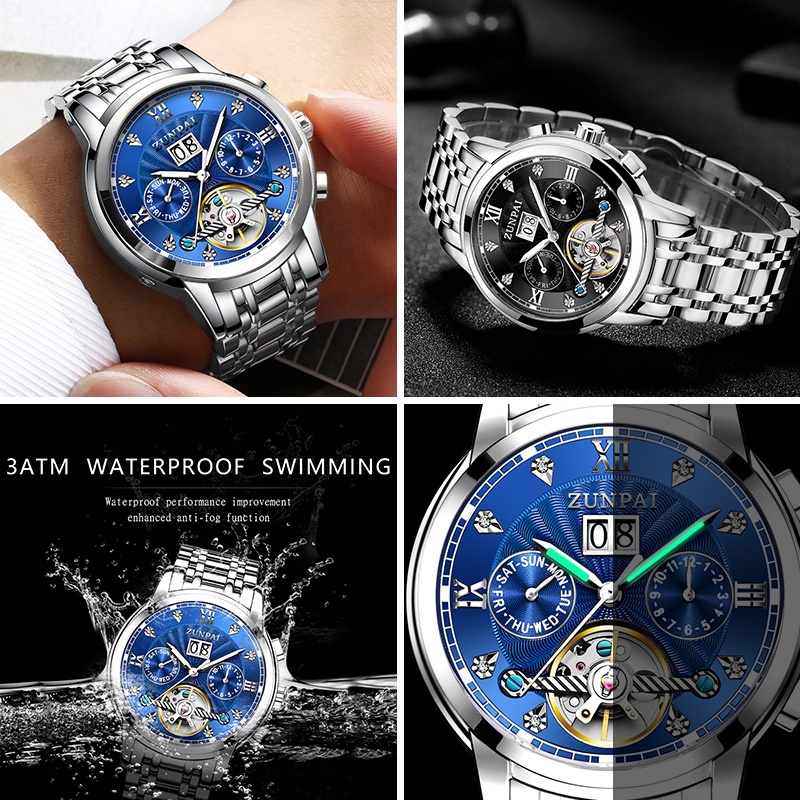 ZUNPAI นาฬิกาข้อมือผู้ชายสายสแตนเลสแบบ Tourbillon อัตโนมัติ พร้อมหน้าต่างกลวง หน้าปัดทรงกลม ทนทานต่อรอยขีดข่วน นาฬิกาแฟชั่นสำหรับธุรกิจ เรียบง่ายและลำลอง กันน้ำ เรืองแสง ปฏิทินถาวร ฟังก์ชันปฏิทินรายสัปดาห์