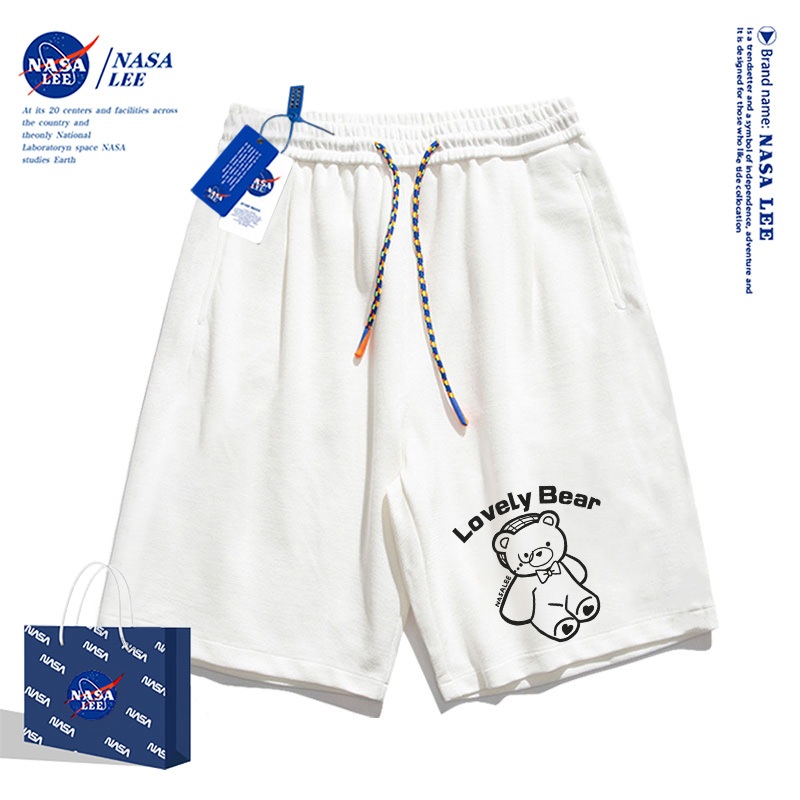 【มีสินค้า】กางเกงขาสั้นสีขาวลายหมีน่ารักจาก NASA รุ่นใหม่ปี 2025 สำหรับเด็กผู้ชาย ฤดูร้อน สไตล์แฟชั่น