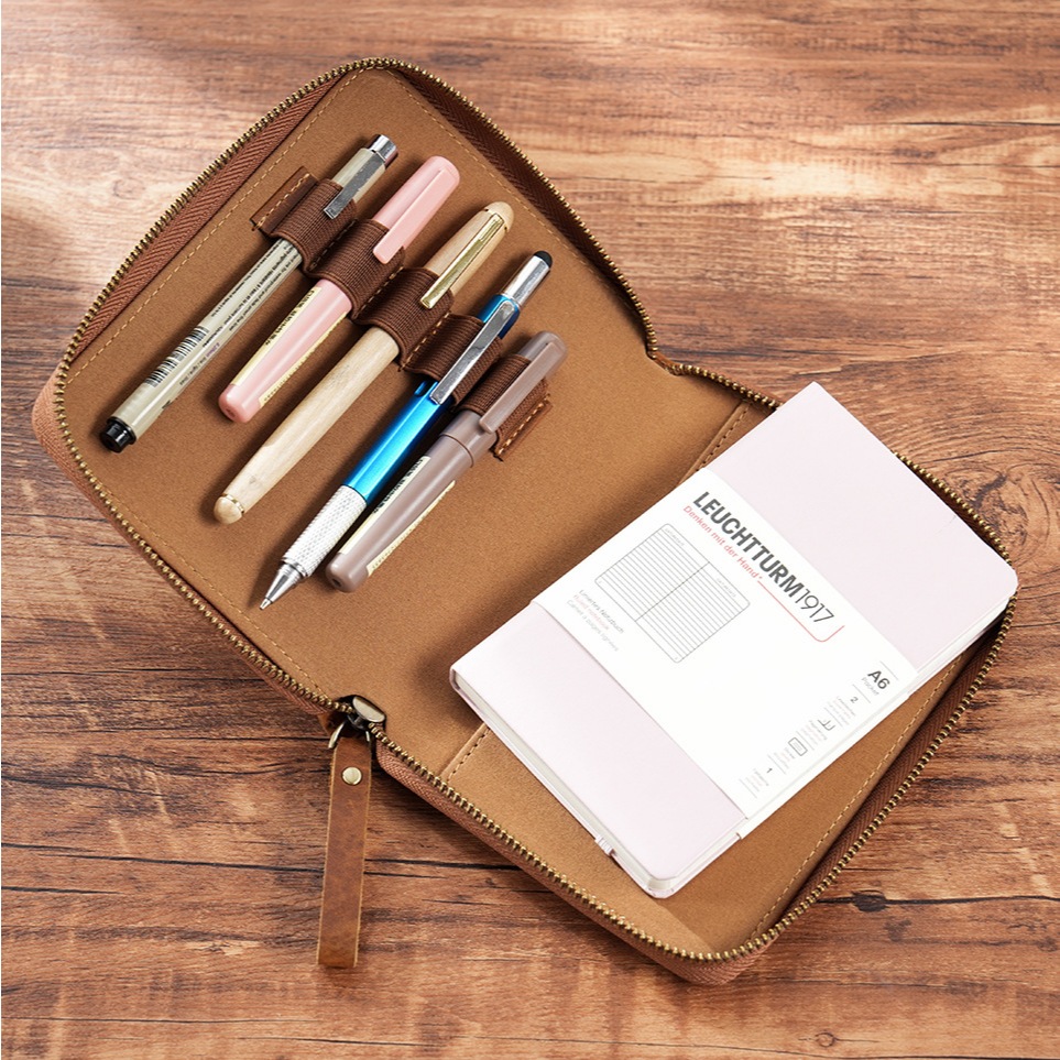 ก6กระเป๋าซิปหน้าคงที่หนังแท้โน๊ตบุ๊คปกหนังสือเปลี่ยนแกน